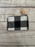 Black and white buffalo print zipper pouch