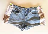 Boho cutoff denim shorts with vintage quilt patchwork
