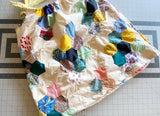 Tank top with adjustable drawstring tie upcycled from quilt