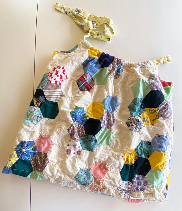 Tank top with adjustable drawstring tie upcycled from quilt