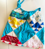 Tank top with adjustable drawstring tie upcycled from quilt