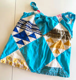 Tank top with adjustable drawstring tie upcycled from quilt