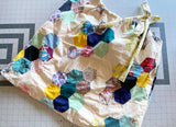 Tank top with adjustable drawstring tie upcycled from quilt