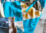 Tank top with adjustable drawstring tie upcycled from quilt