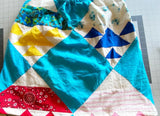 Tank top with adjustable drawstring tie upcycled from quilt