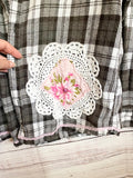 Altered black and white flannel women’s vintage quilt blocks and doilies